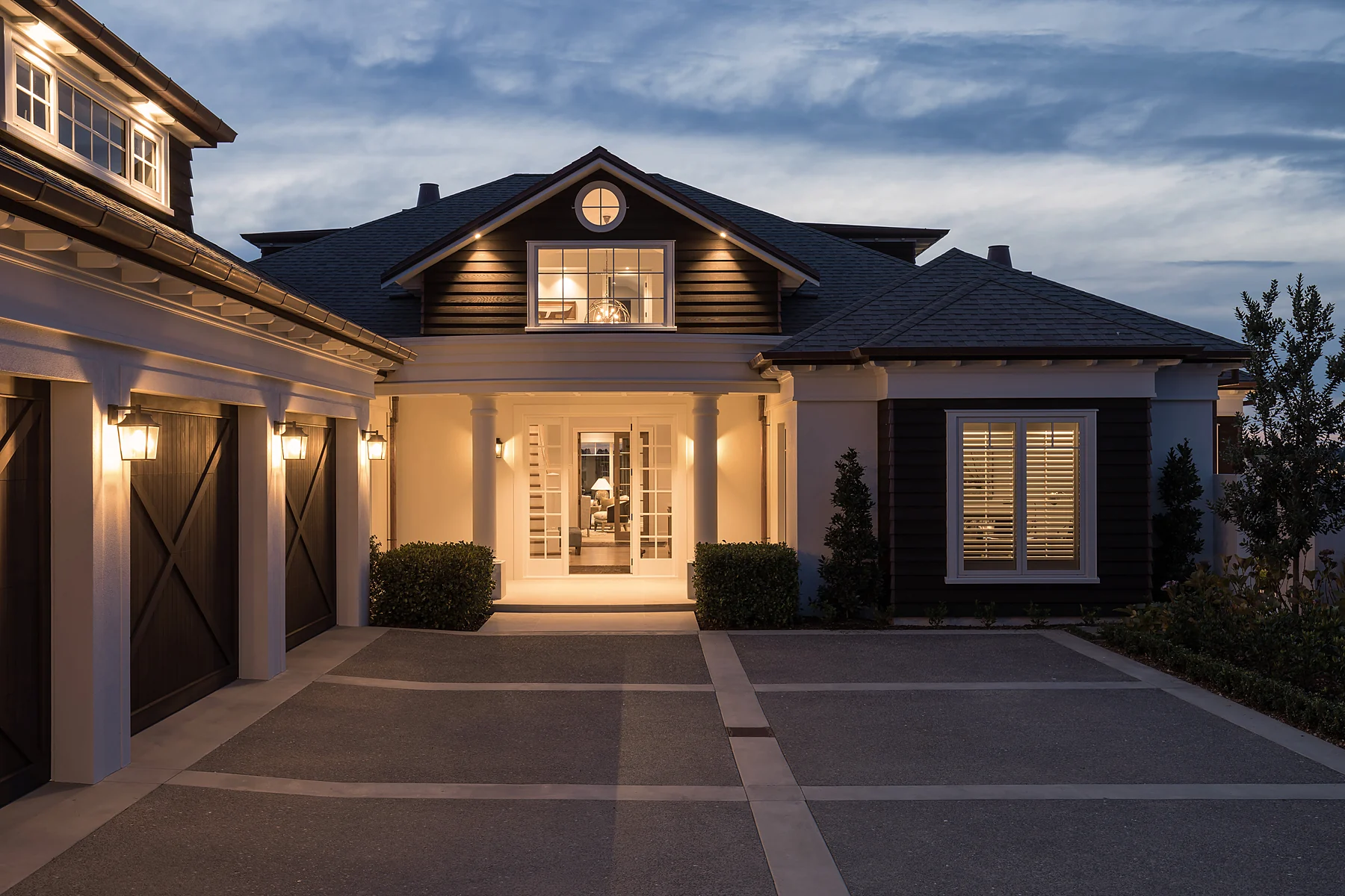 Entry at twilight — hydronic underfloor heating by Champion Heating
