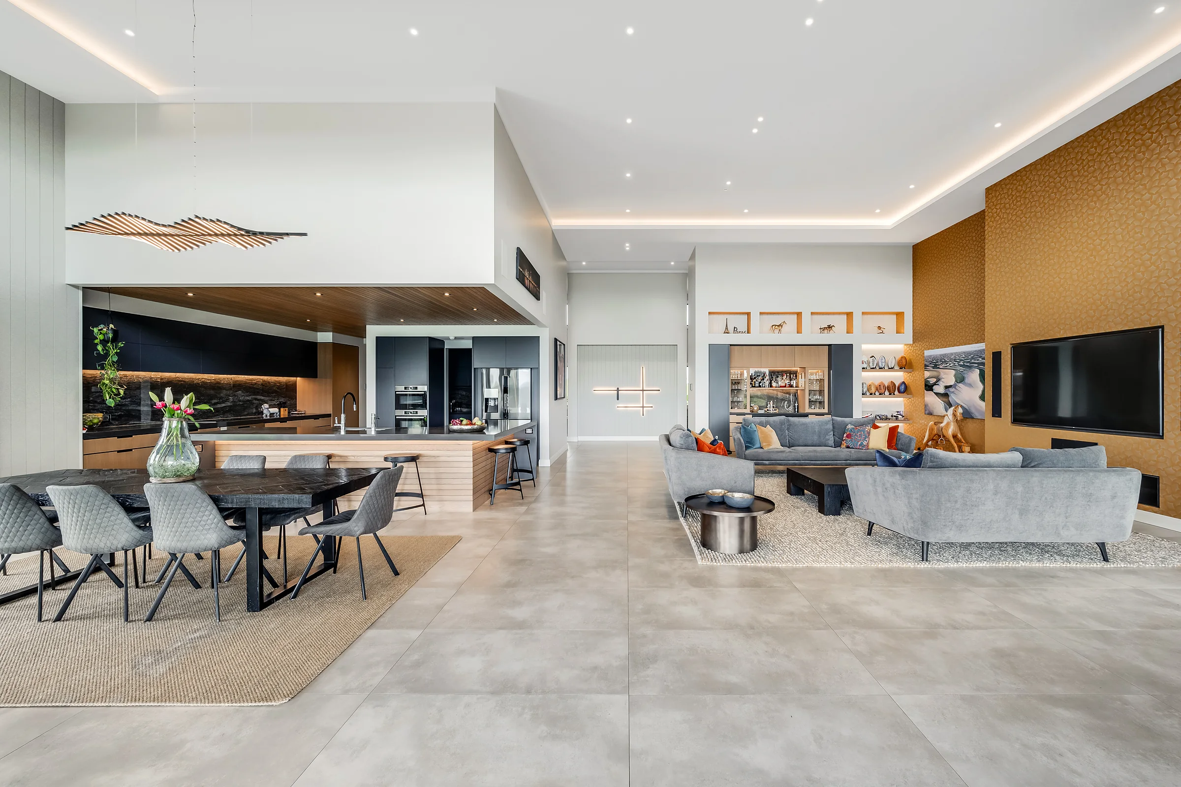 Living and dining — hydronic underfloor heating by Champion Heating
