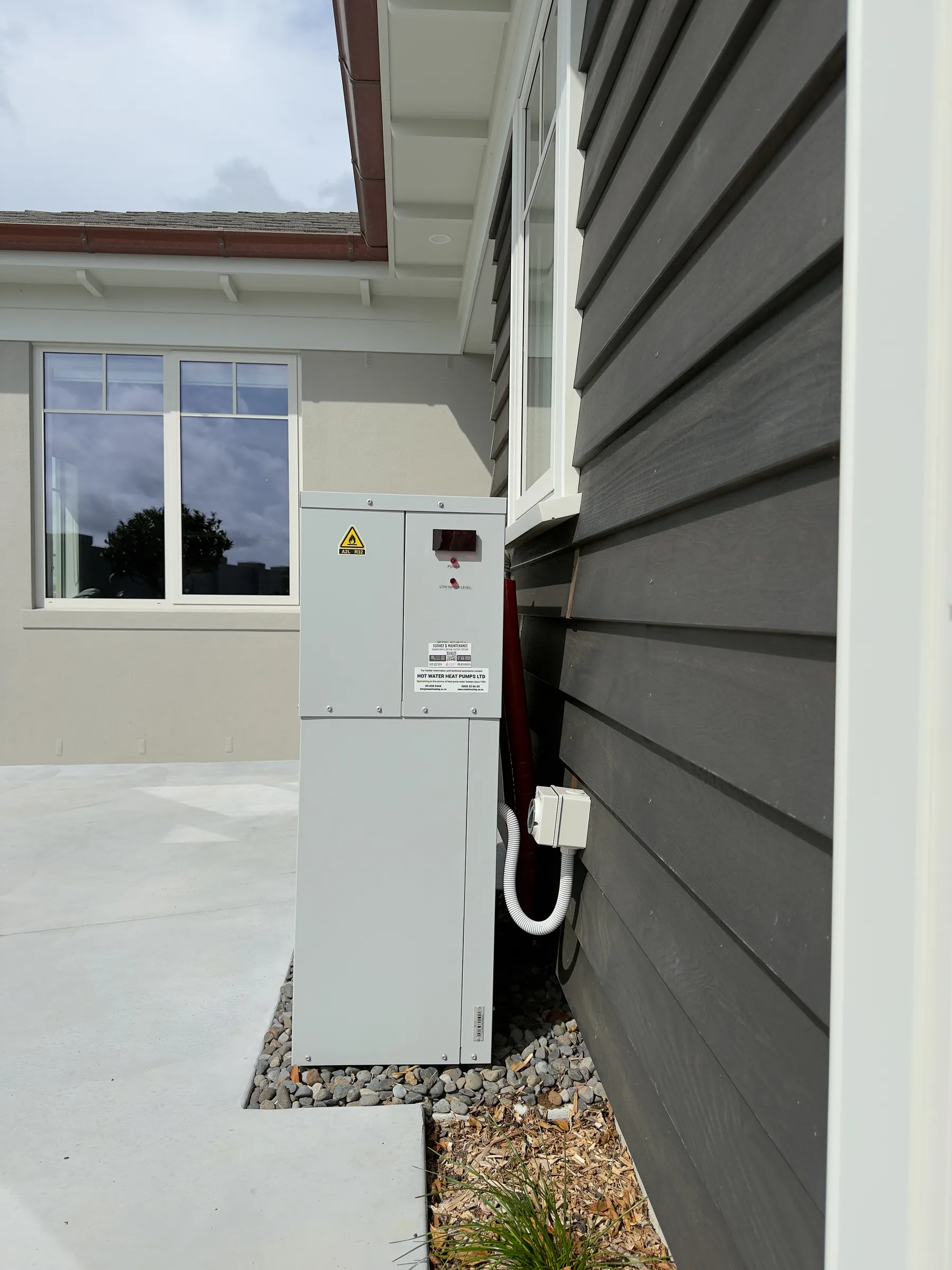 Heat pump unit beside the house, Severina 1