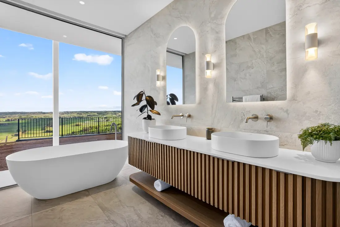 Master ensuite with freestanding bath, double vanity and rural view